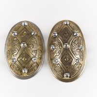 Two oval brooches