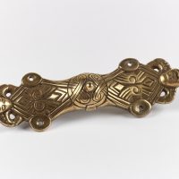 A reproduction, copper alloy, equal-armed brooch from Nottinghamshire