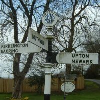 Signpost showing Kirklington, Eakring, Southwell, Upton and Newark
