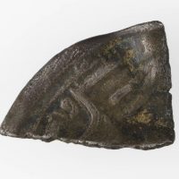 An unidentified silver dirham fragment found in Torksey, Lincolnshire. © The Fitzwilliam Museum, Cambridge