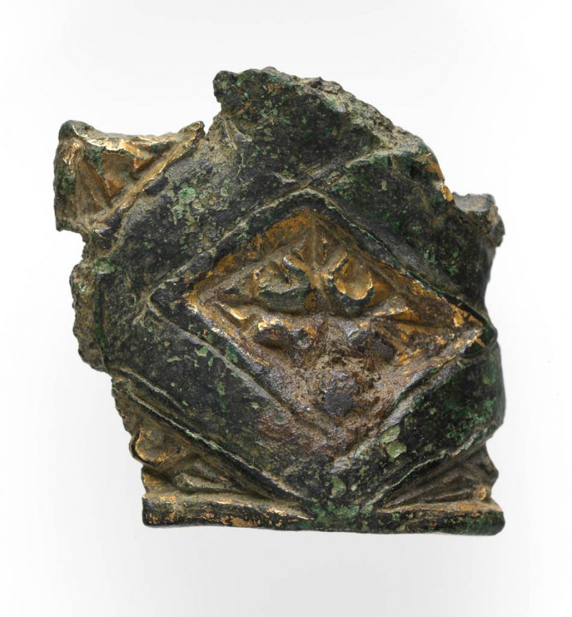 A broken gilt vessel fragment decorated with Carolingian motif found in Torksey, Lincolnshire. © The Fitzwilliam Museum, Cambridge