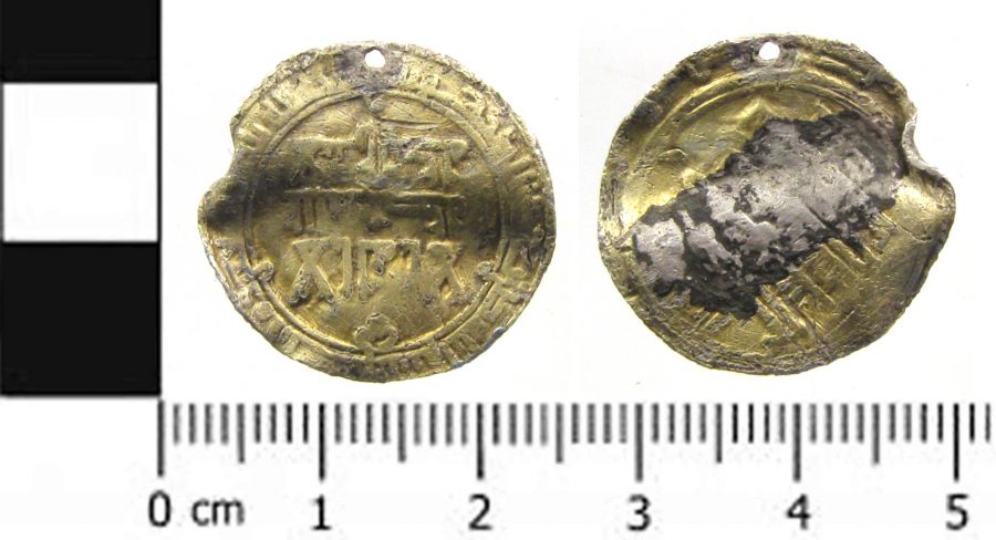 Samanid silver dirham made into a gilded pendant (c) Lincolnshire County Council