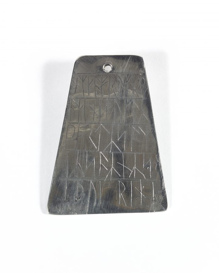 A reproduction lead runic plaque based on an original from St Benet's Abbey, Norfolk. (c) Centre for the Study of the Viking Age