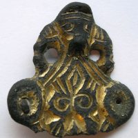 A gilded, copper alloy equal armed-brooch found in Harworth Bircotes, Nottinghamshire with a Borre Style animal.