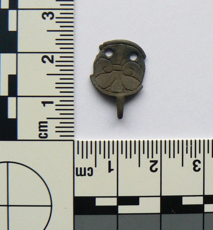 A silver hooked tag with trefoil motif found near Sleaford, Lincolnshire. (c) Portable Antiquities Scheme, CC BY-SA 2.0