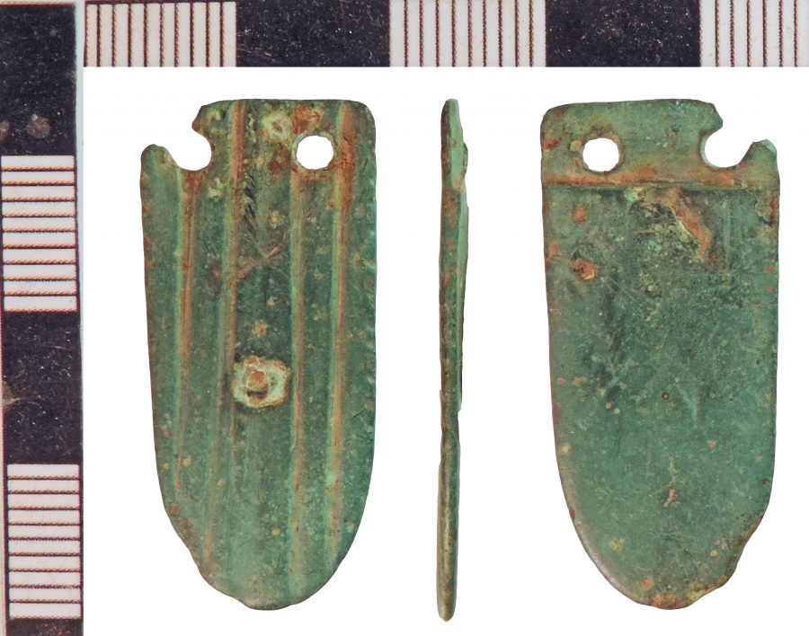 A cast tongue shaped coper-alloy strap end found near Haxey, Lincolnshire. (c) Portable Antiquities Scheme, CC BY-SA 2.0